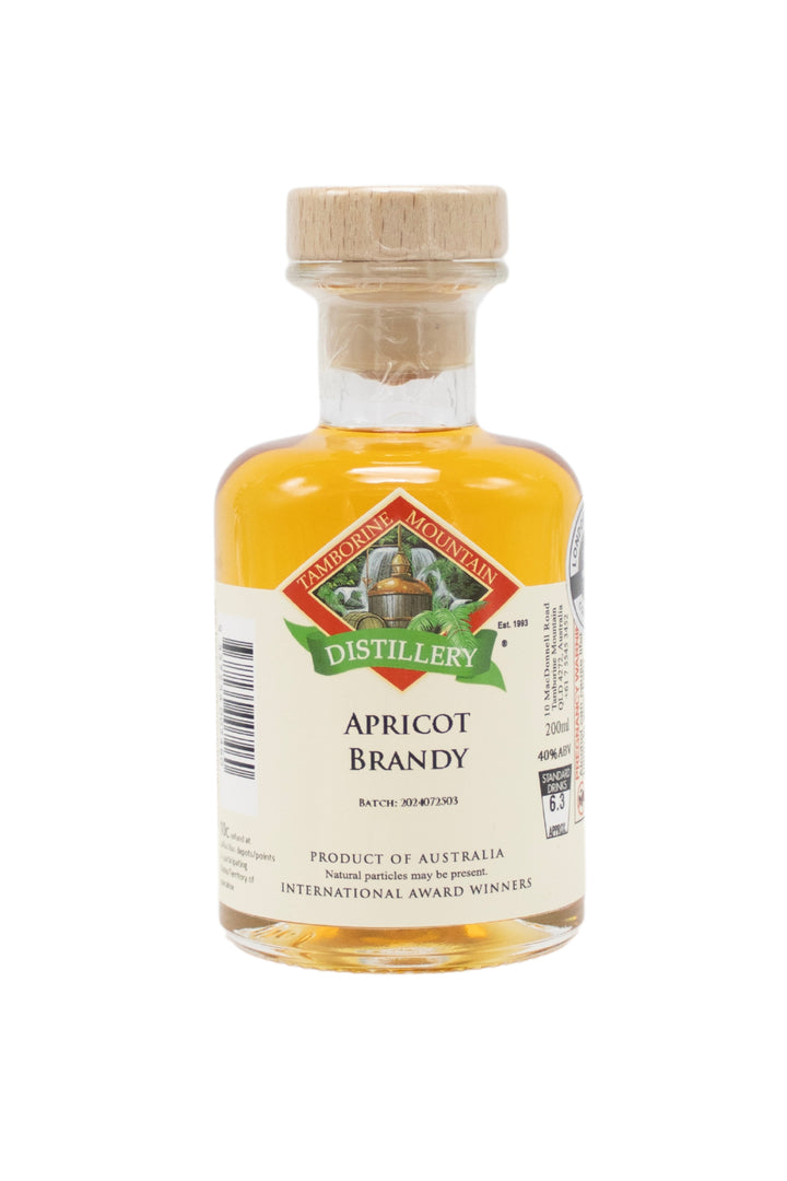 200ml handcrafted bottle of Tamborine Mountain Distillery’s Apricot Brandy, in clear glass with small artisan label