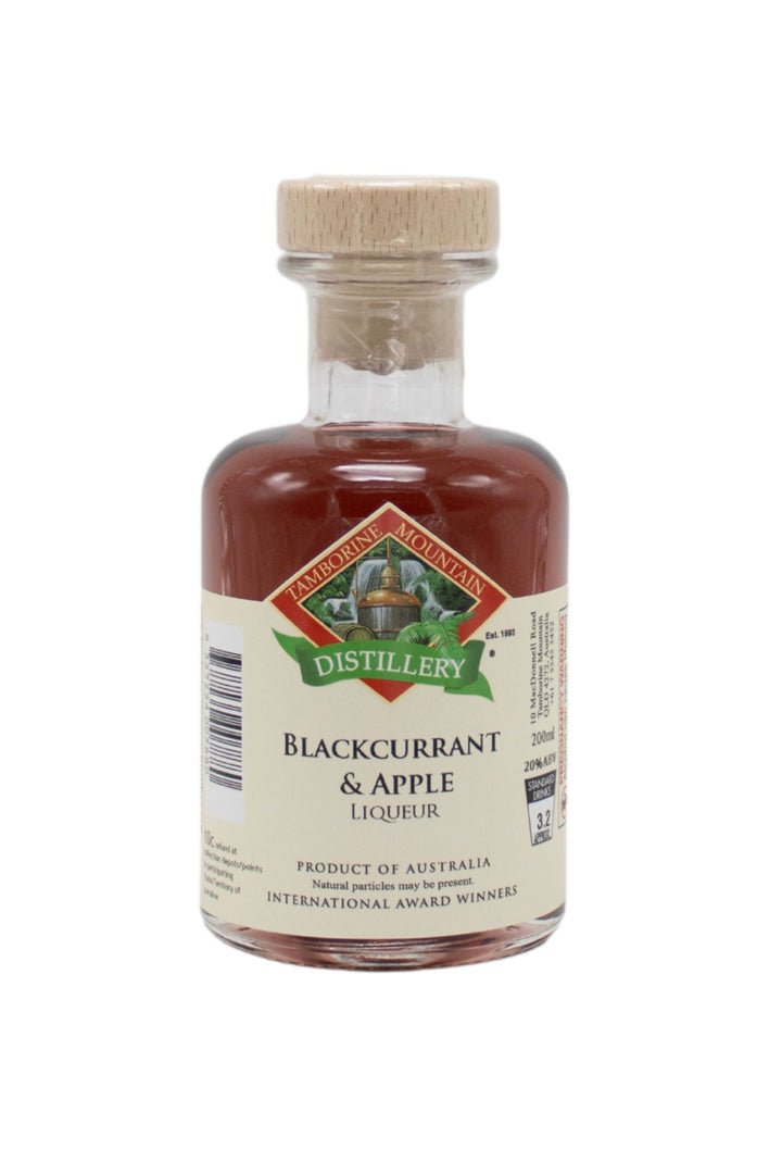 200ml handcrafted bottle of Tamborine Mountain Distillery’s Blackcurrant & Apple Liqueur, in clear glass with small artisan label