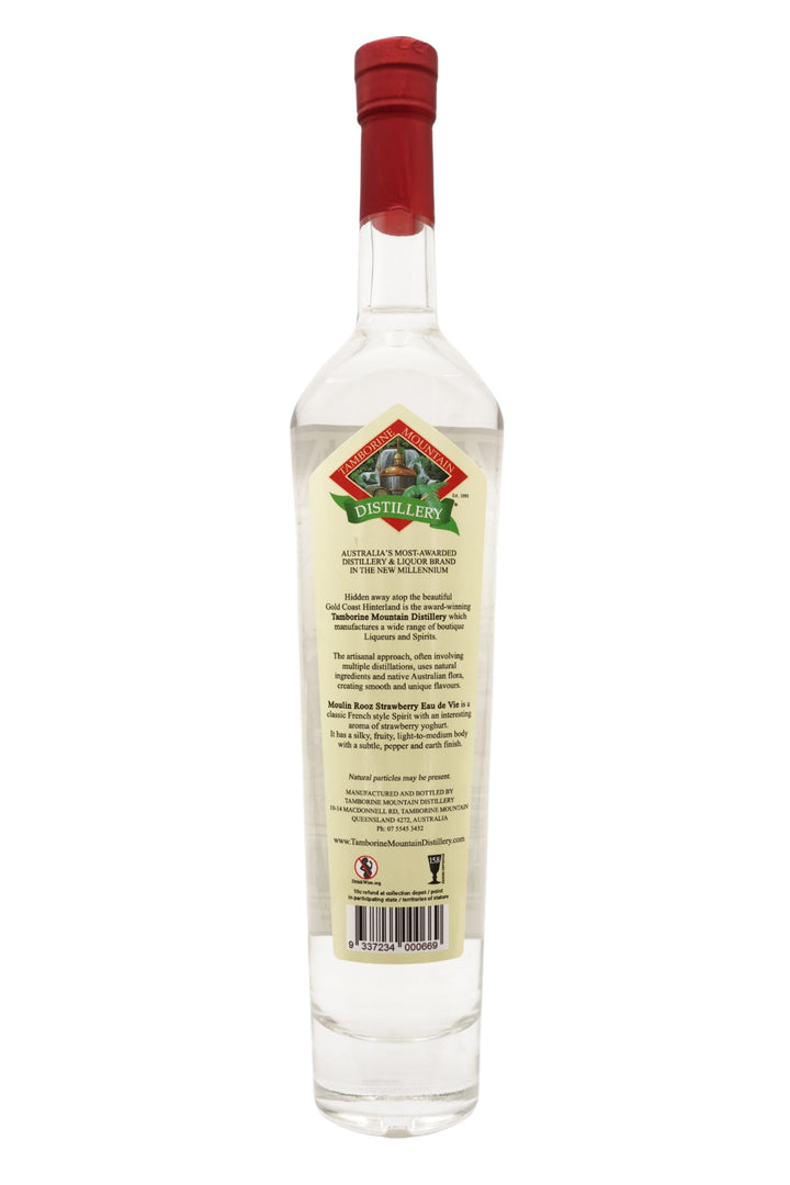 Back of 500ml clear glass bottle of Tamborine Mountain Distillery Eau de Vie Strawberry, Moulin Rooz edition, featuring a detailed label with a playful kangaroo illustration.