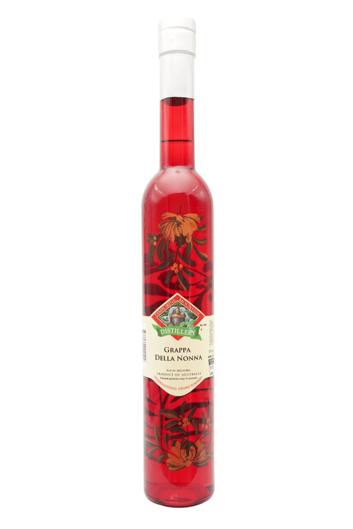375ml handcrafted bottle of Tamborine Mountain Distillery’s Grappa Della Nona, featuring botanical artwork, coloured glass, and small artisan label