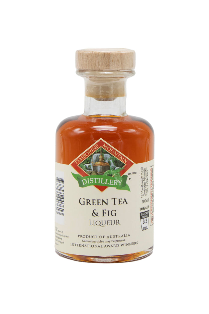 200ml handcrafted bottle of Tamborine Mountain Distillery’s Green Tea & Fig Liqueur, in clear glass with small artisan label