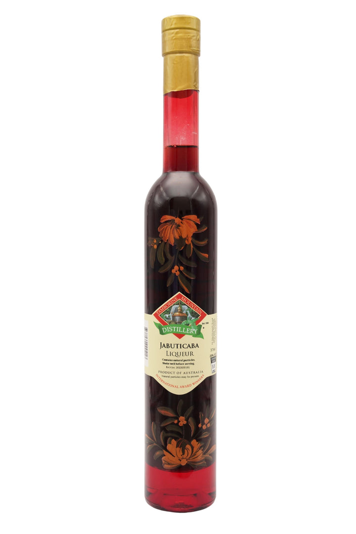 375ml handcrafted bottle of Tamborine Mountain Distillery’s Jabuticaba Liqueur, featuring botanical artwork, coloured glass, and small artisan label