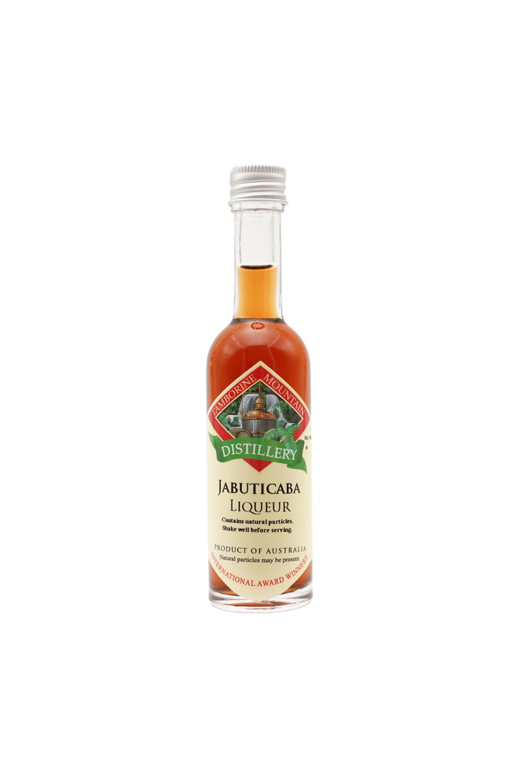 55ml handcrafted bottle of Tamborine Mountain Distillery’s Jabuticaba Liqueur, in clear glass with small artisan label