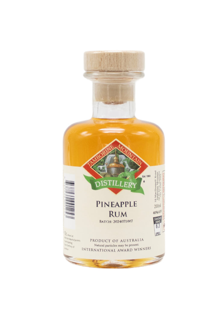 200ml handcrafted bottle of Tamborine Mountain Distillery’s Pineapple Rum, in clear glass with small artisan label