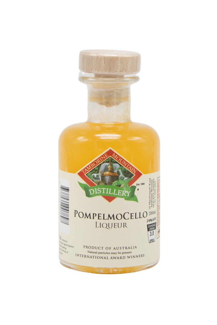 200ml handcrafted bottle of Tamborine Mountain Distillery’s Pompelmocello, in clear glass with small artisan label