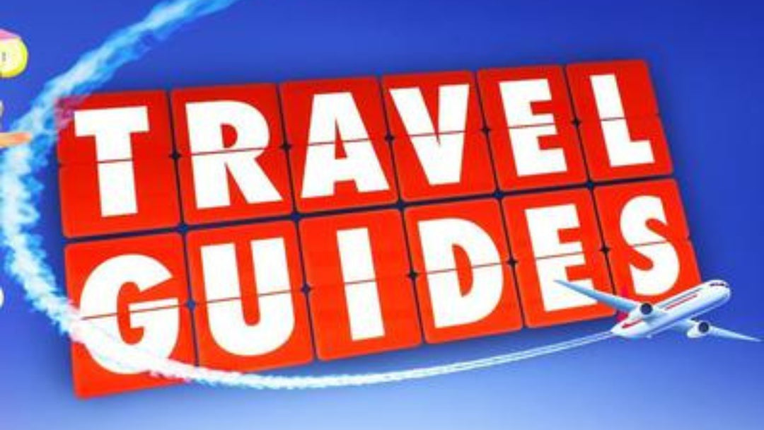 Red blocks with 'TRAVEL GUIDES' text on a blue background with airplane icon