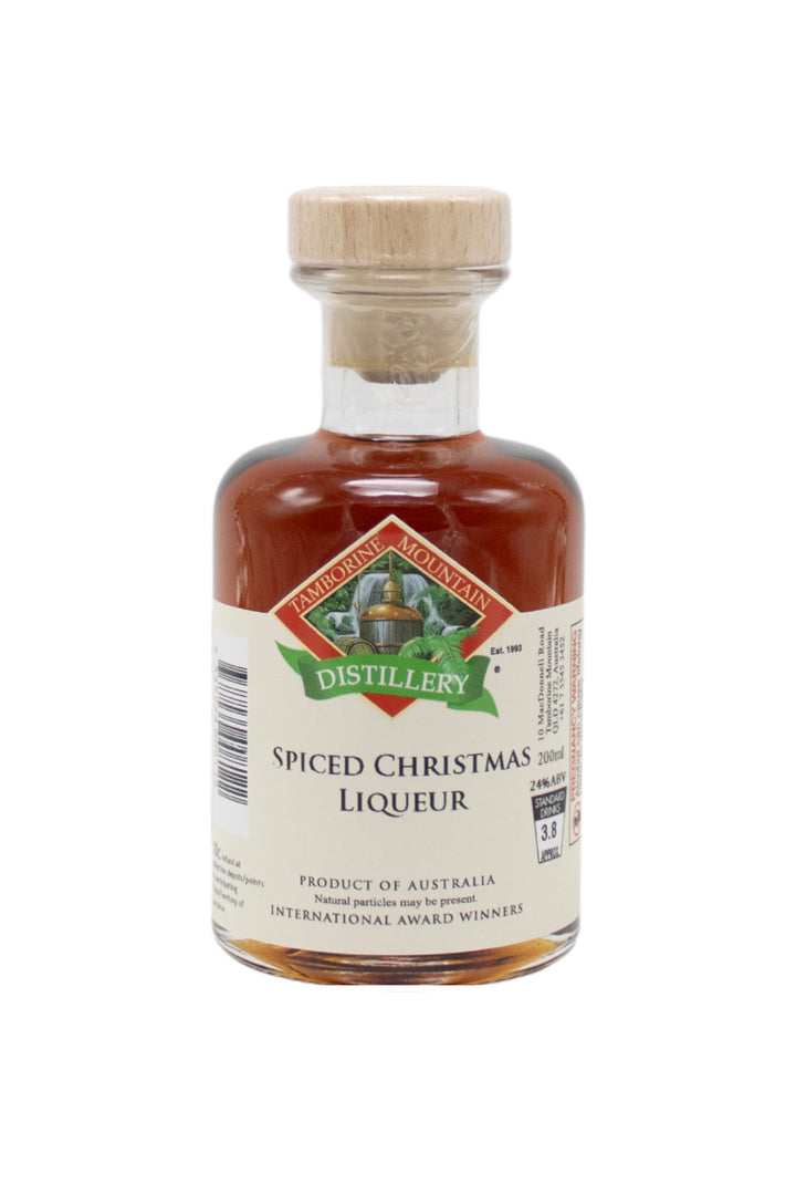 200ml handcrafted bottle of Tamborine Mountain Distillery’s Spiced Christmas Liqueur, in clear glass with small artisan label