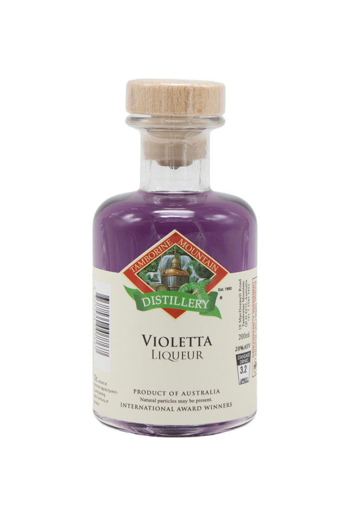 200ml handcrafted bottle of Tamborine Mountain Distillery’s Violetta Liqueur, in clear glass with small artisan label