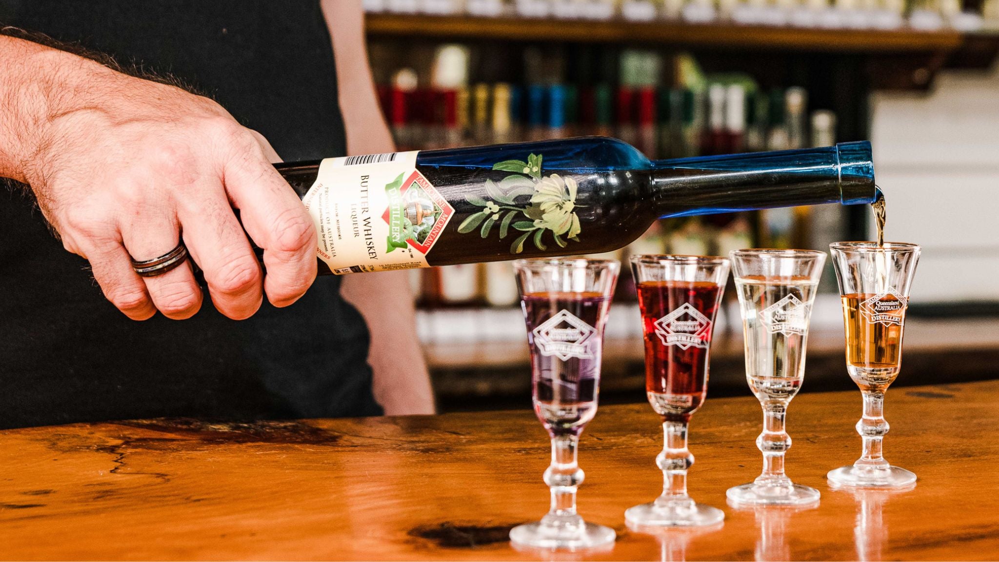 bartender pouring a tasting