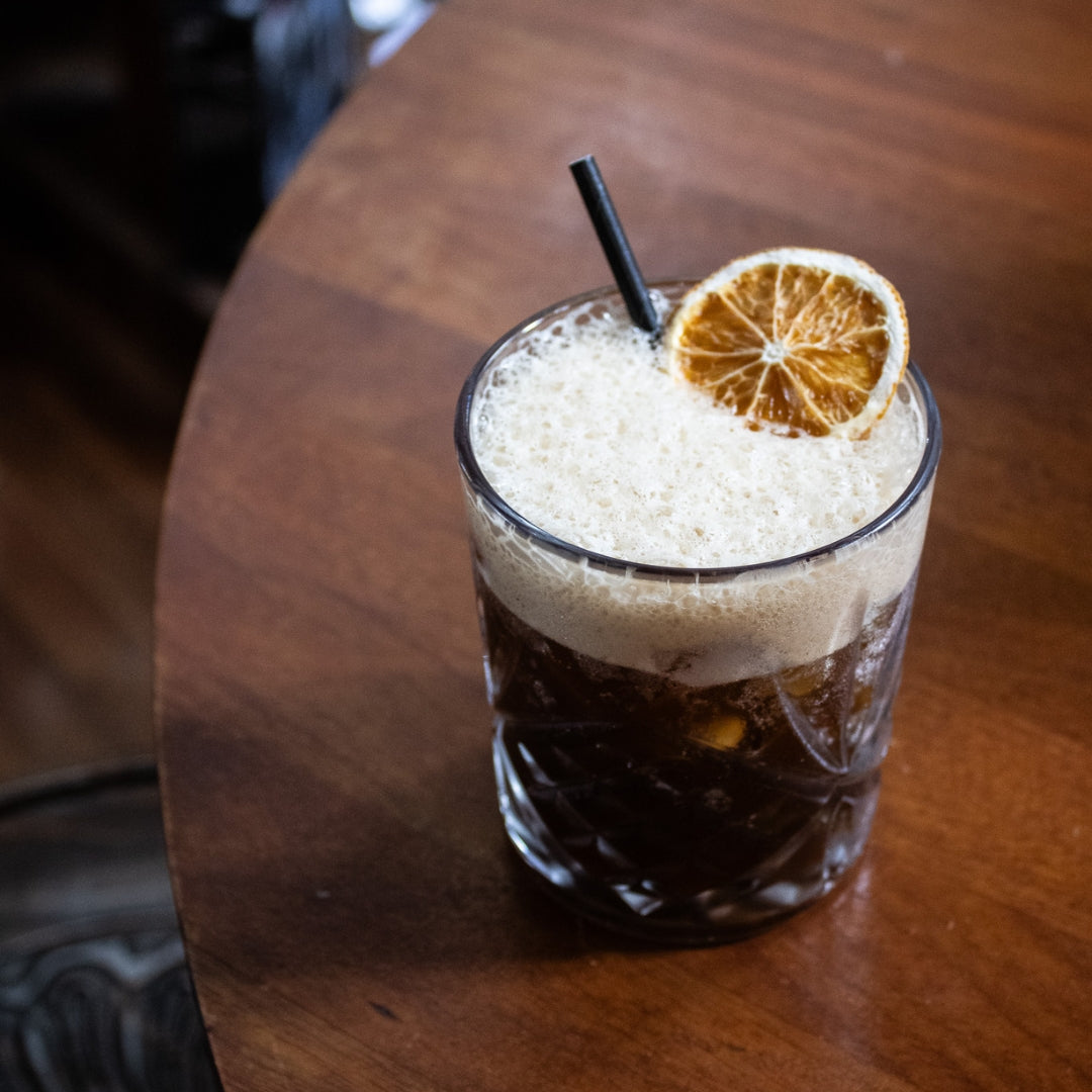 Coffee Blonde cocktail with dehydrated orange