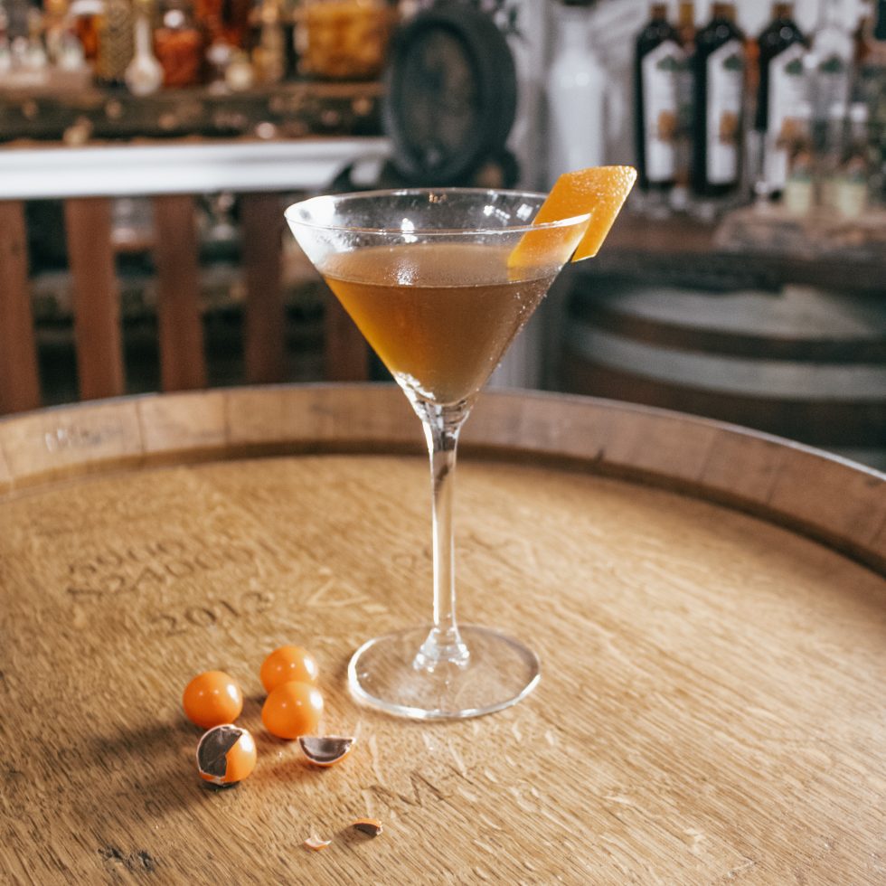 Close-up of Choc Orange Martini showing creamy chocolate-orange cocktail and orange garnish
