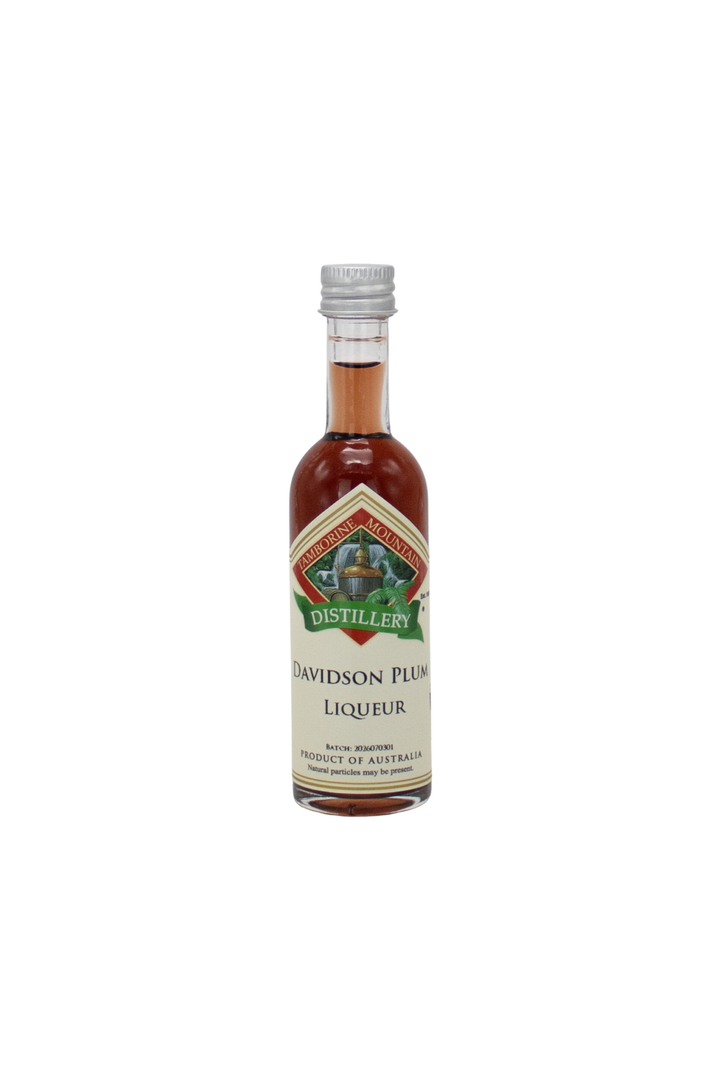55ml handcrafted bottle of Tamborine Mountain Distillery’s Davidson Plum Liqueur, in clear glass with small artisan label