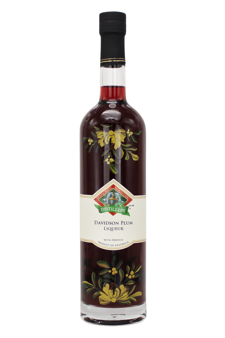700ml handcrafted bottle of Tamborine Mountain Distillery’s Davidson Plum Liqueur, in clear glass with small artisan label